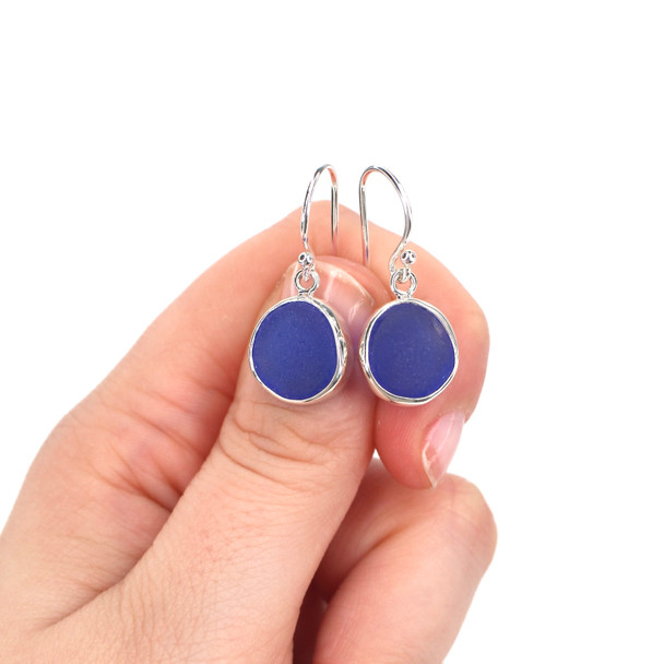 Cobalt Perfect Circle Sea Glass Bezel Earrings on model for color reference.