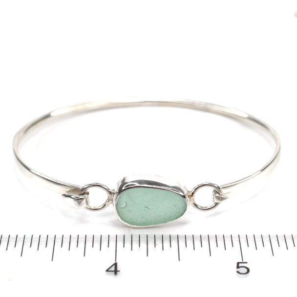 Seafoam Oval Sea Glass Bezel Bangle Bracelet on ruler