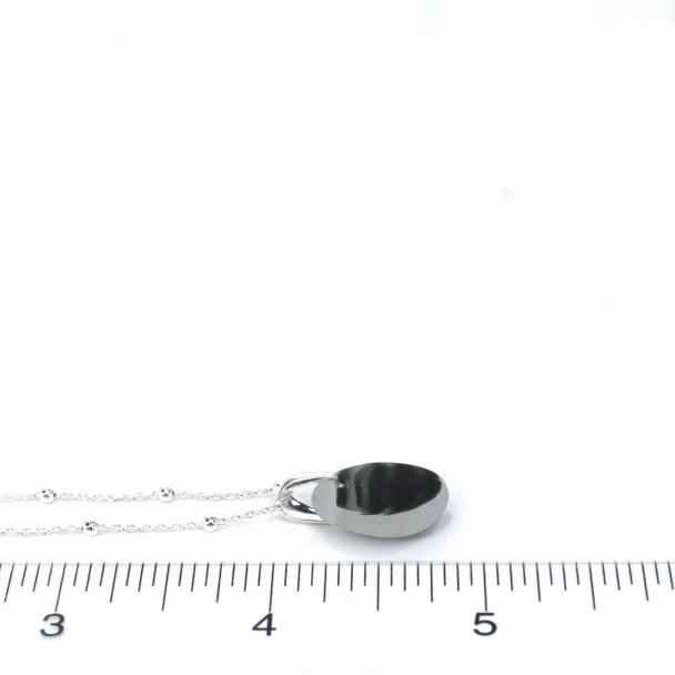 Gray Waves Ultra Rare Sea Glass Drop Necklace on ruler for size reference. 
