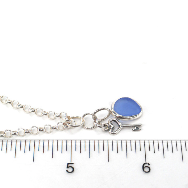 Cornflower Sea Glass and Key Charm Necklace on ruler for size 