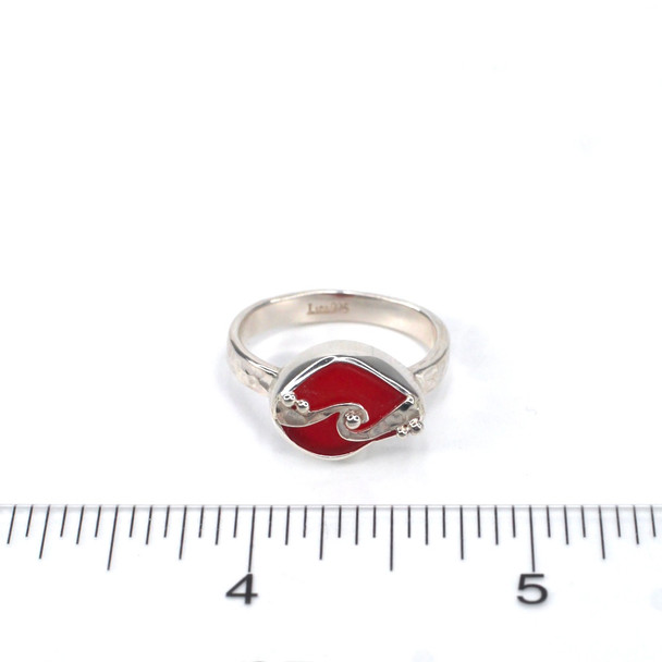 Red Sea Glass Wave Ring on ruler for size reference. 

