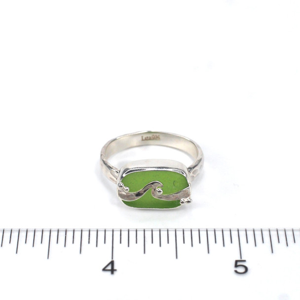 Lime Green Sea Glass Wave Ring on ruler for size reference. 
