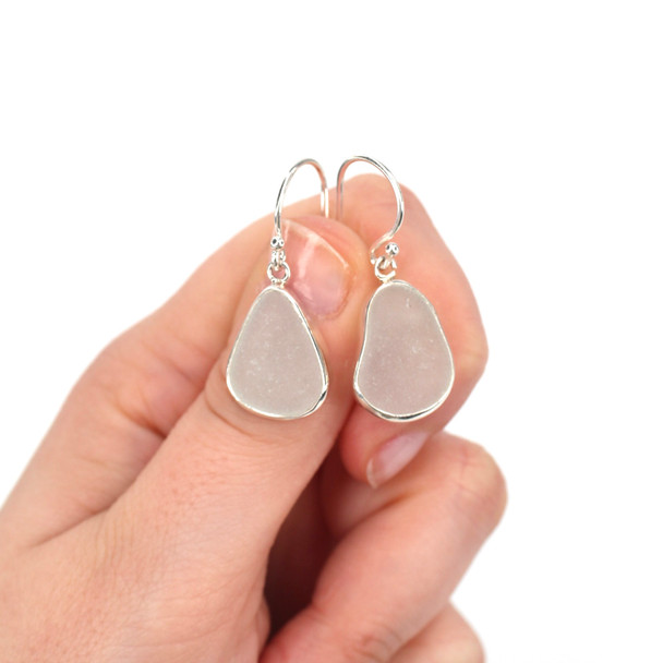 White Winter Sea Glass Single Bezel Earrings on model for color reference.