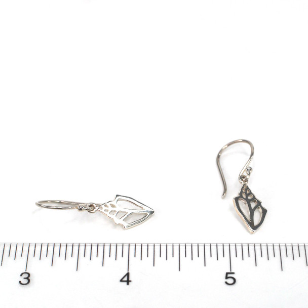 Sterling Silver Conch Shell Earring on ruler for size reference. 
