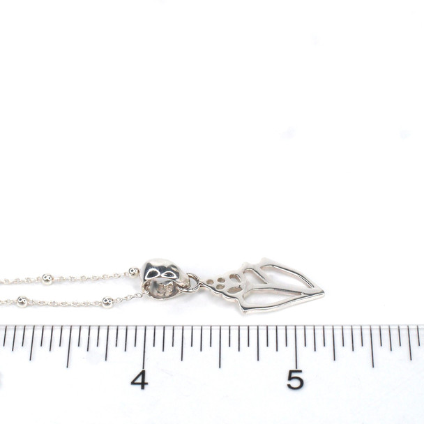 Sterling Silver Conch Shell Necklace on ruler for size reference. 

