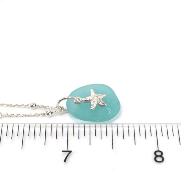 Aqua Sea Glass Tiny Starfish Nautical Necklace on ruler for size reference. 