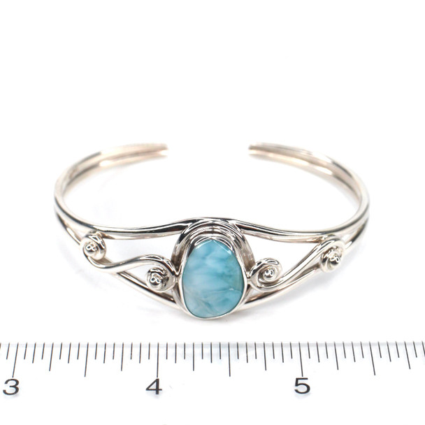 Larimar Ocean Swirl Cuff Bracelet on ruler for size reference. 
