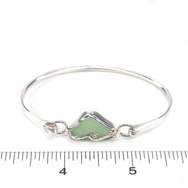 Seafoam Sea Glass Wave Bracelet on ruler for size reference. 