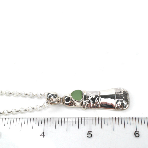 Seafoam UV Milk Glass Lighthouse Necklace on ruler