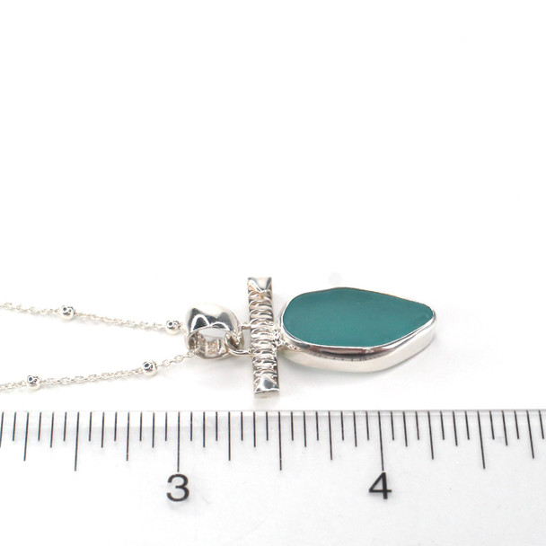 Aqua Oval Sea Glass Toggle Bar Necklace on ruler for size reference. 