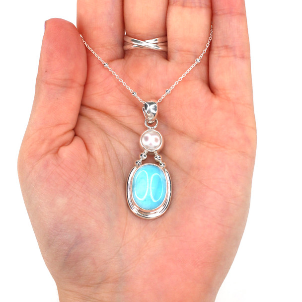 Larimar and Freshwater Pearl Oval Beaded Necklace on model for color reference. 

