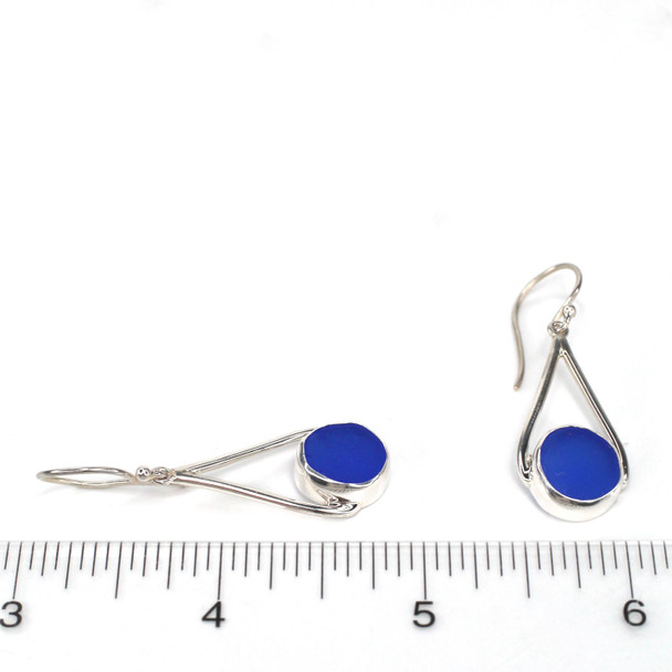 Cobalt Circle Sea Glass Lunar Drop Earrings on ruler for size reference. 


