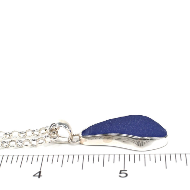 Cornflower Medium Drop Sea Glass Bezel Necklace on ruler for size reference.