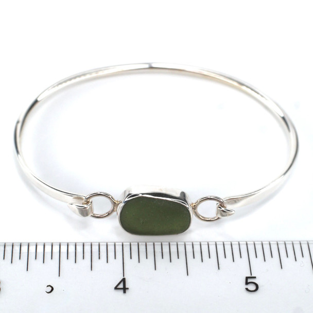 Olive Oval Sea Glass Hinge Bangle Bracelet on ruler for size reference. 