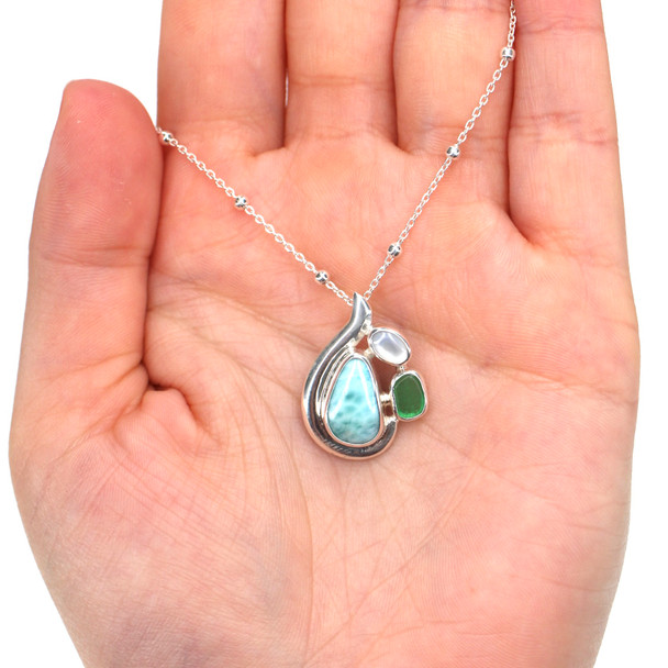 Green Sea Glass Larimar and Pearl Wisp Pendant on model for color reference.