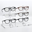 Double Optical Frame Display Risers with 2x3 Triangular Clips in a Row.