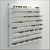 DW Wall Mount Optical Shelf Display with 8 Open Shelves - 47.5" Wide