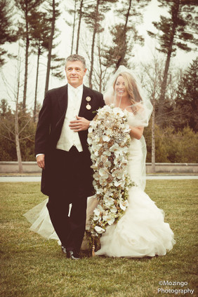 Asley & Clay's Wedding....They used Flyboy Naturals Ivory Peony Petals to create a stunning scroll pattern on their aisle at the Biltmore Estate.