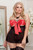 Satin bow, mesh, and microfiber babydoll with adjustable peek-a-boo front bow tie, underwire open cups, hook and eye back closure with keyhole and g-string. 

90% Nylon 10% Spandex