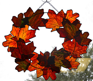Autumn wreath made from art glass leaves in beautiful fall colors Autumn wreath made from art glass leaves in beautiful fall colors