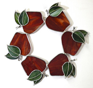 Red apple art glass suncatcher with green leaves Red apple art glass suncatcher with green leaves
