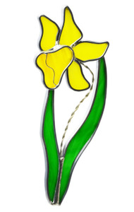 Daffodil art glass suncatcher, yellow flower with green leaves Daffodil art glass suncatcher, yellow flower with green leaves