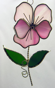 Pink pansy with green leaves art glass suncatcher Pink pansy with green leaves art glass suncatcher
