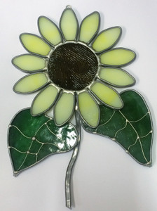 Large yellow art glass sunflower suncatcher with green leaves
