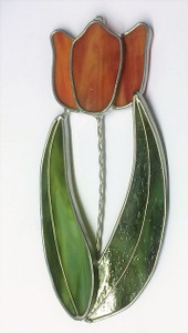 Orange single tulip art glass suncatcher with green leaves Orange single tulip art glass suncatcher with green leaves