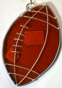 Football art glass suncatcher in bronze amber Football art glass suncatcher in bronze amber