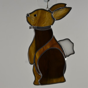 Standing art glass bunny suncatcher in brown and white opalescent glass