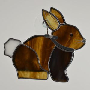 Sitting art glass bunny suncatcher in brown and white opalescent glass