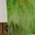 Detail of 99 (Darker Green (659), Light Amber (181), White) Opalescent Combination Art Sheet Glass by KOG Kokomo Opalescent Glass Flemish Texture Showing Opacity