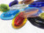 Oval Art Glass Pressed Jewel Shown in Assorted Colors