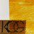 Detail of 144 (Medium Amber, Clear) Streaky Art Sheet Glass by KOG Kokomo Opalescent Glass Granite Texture Showing Opacity