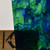Detail of 142LL (Blue (600), Green (659), Clear) Streaky Art Sheet Glass by KOG Kokomo Opalescent Glass Flemish Texture Showing Opacity Detail of 142LL (Blue (600), Green (659), Clear) Streaky Art Sheet Glass by KOG Kokomo Opalescent Glass Flemish Texture Showing Opacity