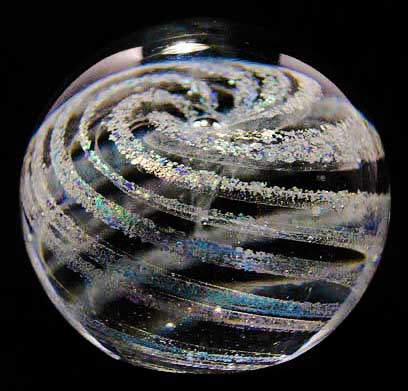 a clear and multi-colored memorial glass sphere