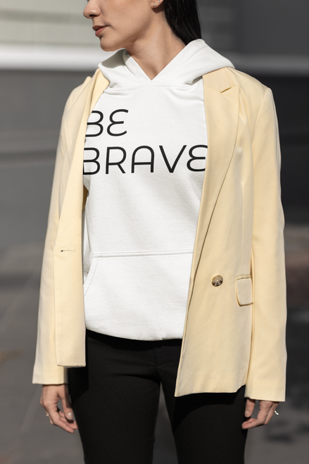white gildan  hoodie  mockup  featuring  a  cropped  face  woman  in  a  modest  fashion  style with BE BRAVE