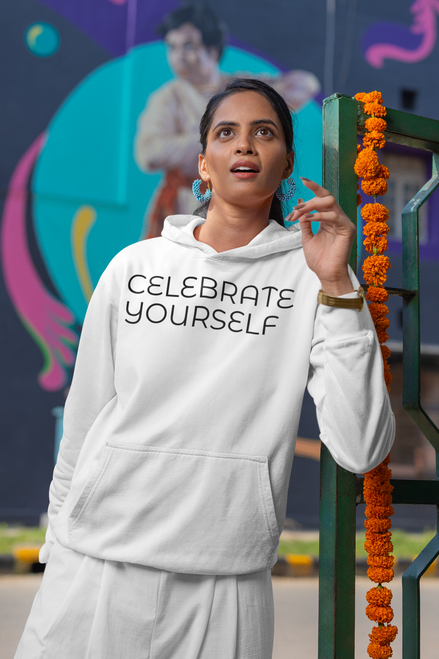 white gildan  hoodie  mockup  of  a  woman  with  a  surprised  expression  looking  up with CELEBRATE YOURSELF
