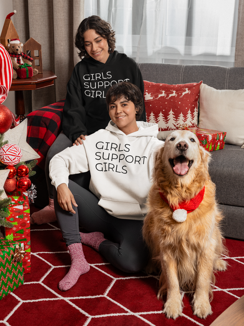white gildan  hoodie  mockup  of  two  women  posing  with  a  cute  dog  in  a Xmas  decorated  room with GIRLS SUPPORT GIRLS