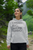 Sport grey gildan  pullover  hoodie  mockup  of  a  woman  on  a  mountain