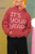 new  pop  wave  style  mockup  of  a  smiling  woman  wearing  a  red gildan  hoodie with IT’S YOUR YEAR