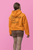 back  view  Orange gildan  hoodie  mockup  of  a  woman  posing  in  a  customizable  background