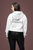 back  view  mockup  featuring  a  rocker  woman  wearing  a  white gildan  pullover  hoodie with CHASE YOUR DREAMS