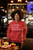 red gildan  pullover  hoodie  mockup  of  a  happy  woman  having  food  and  drinks  in  a  sports  bar with CHASE YOUR DREAMS