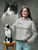 Sport grey gildan  hoodie  mockup  of  a  woman  taking  a  picture  in  a  studio  with  her  pet cat with I AM A SURVIVOR