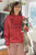 red gildan pullover hoodie mockup of a woman posing with her cat at home with BE A CHANGE AGENT!