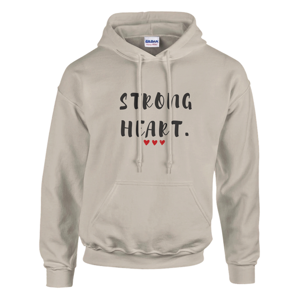 Sand-colored pullover hoodie displayed against a transparent background. The front features the inspirational message “STRONG HEART.” in distressed black lettering, accented by three small red hearts beneath the text. The hoodie includes a drawstring hood, spacious kangaroo pocket, and ribbed cuffs and hem. The neutral sand color gives the design a warm, comforting appearance, while the message symbolizes courage, resilience, hope, and inner strength. This uplifting hoodie is ideal for cancer awareness, recovery journeys, heart health advocacy, and everyday encouragement.