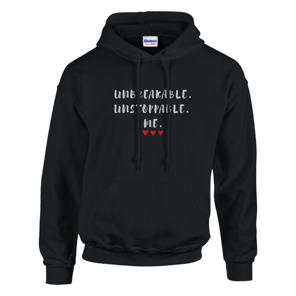 Black pullover hoodie featuring the inspirational quote “Unbreakable. Unstoppable. Me.” with red heart accents, motivational unisex sweatshirt design celebrating strength, resilience, confidence, and self-empowerment.