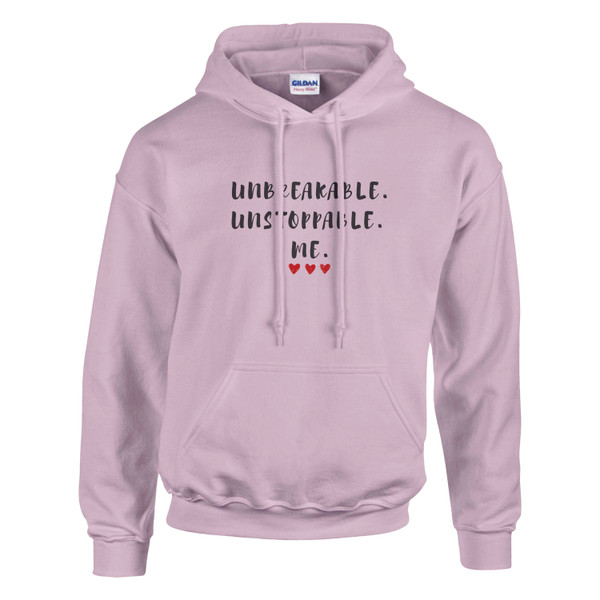 Pink pullover hoodie featuring the inspirational quote “Unbreakable. Unstoppable. Me.” with red heart accents, motivational unisex sweatshirt design celebrating strength, resilience, confidence, and self-empowerment.